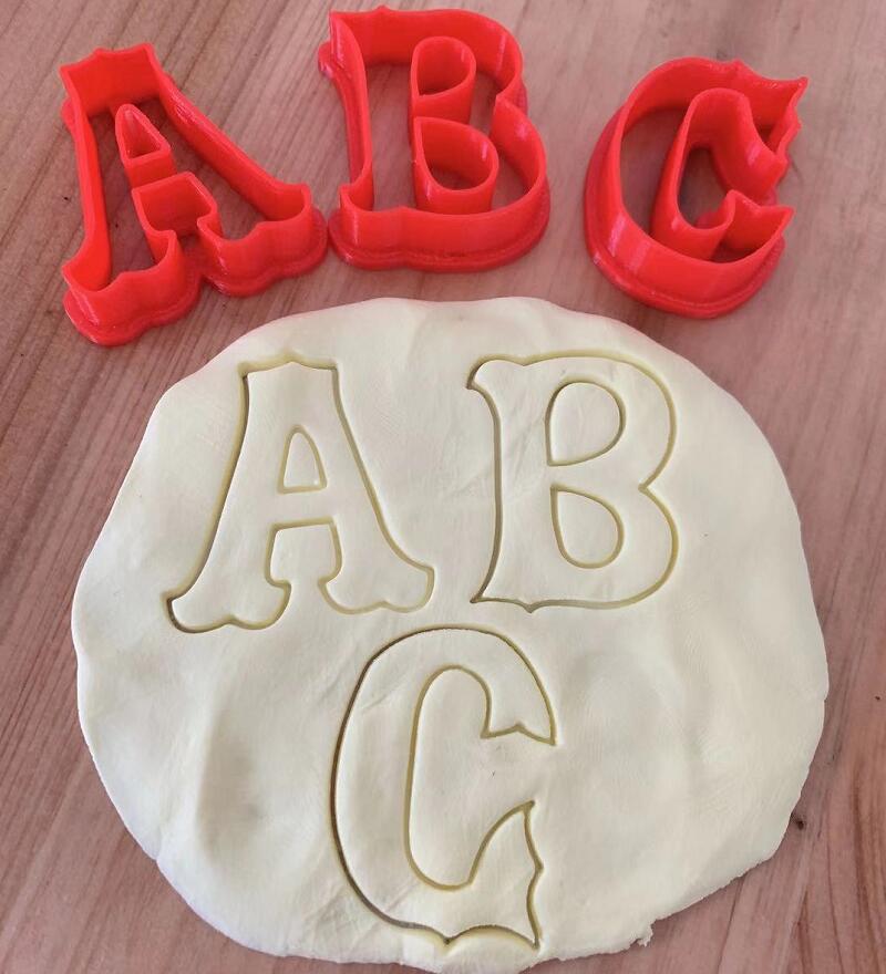 Cake-Tool-alphabet-cutter-fish-tail-plastic-fondant-cutter-mold-fondant-embosser-stamp-press-cake-decorating Torta Szerszám Ábécé Vágó Hal Farkas Műanyag Fondant Vágó Penész Fondant Dombornyomás Bélyeg Press Torta Dekorációs Szerszámok Cukrász - Image 1