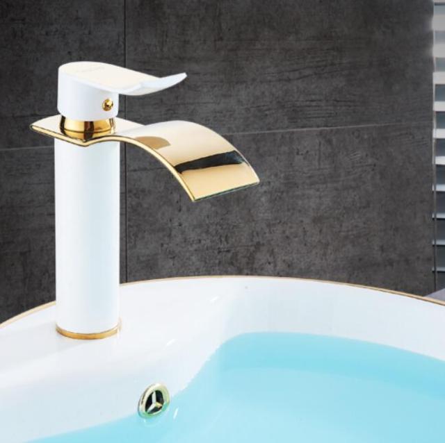 white and gold S